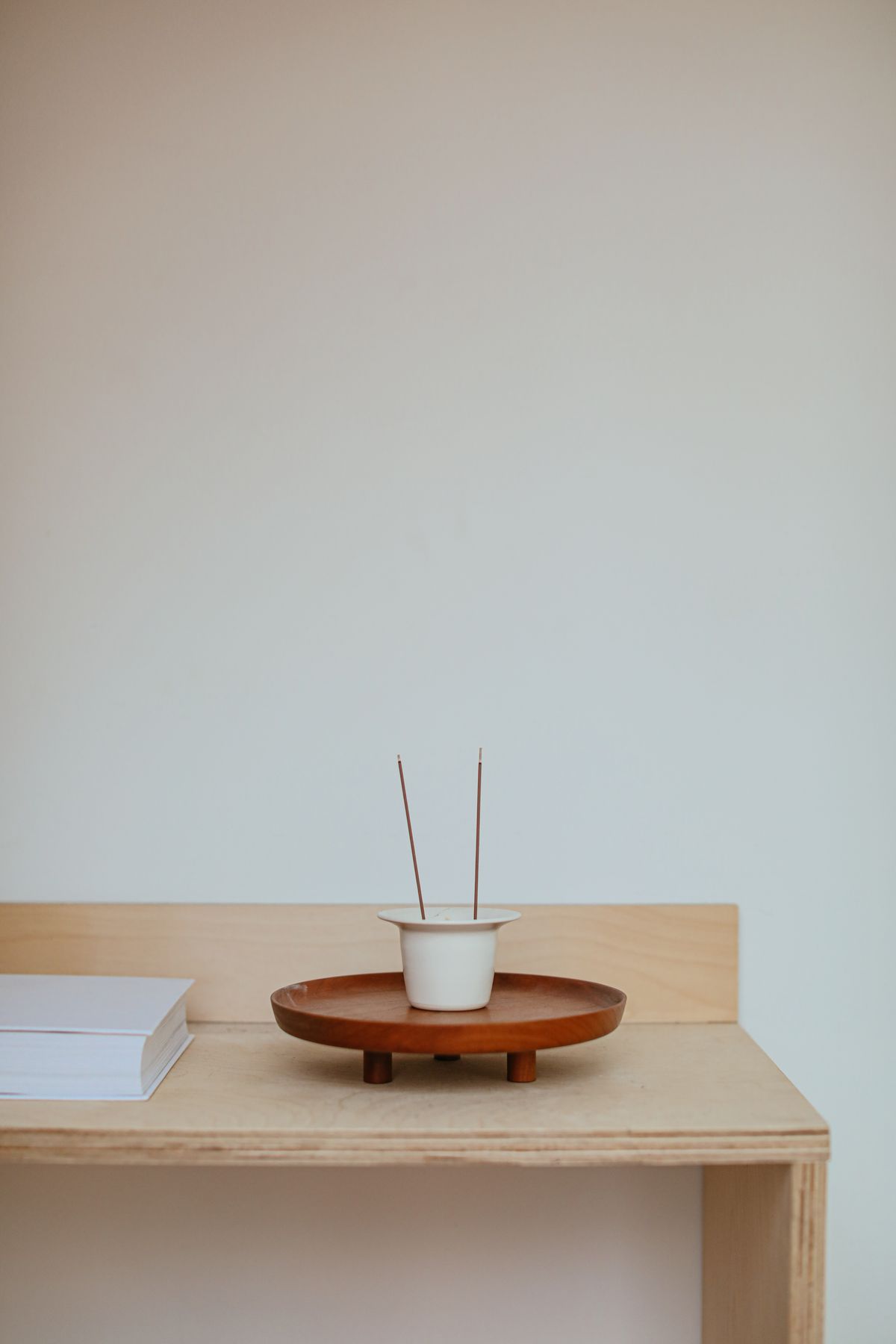 Representative stock photo of incense sticks in a holder; not the actual Lunaris Hollow product or pack.